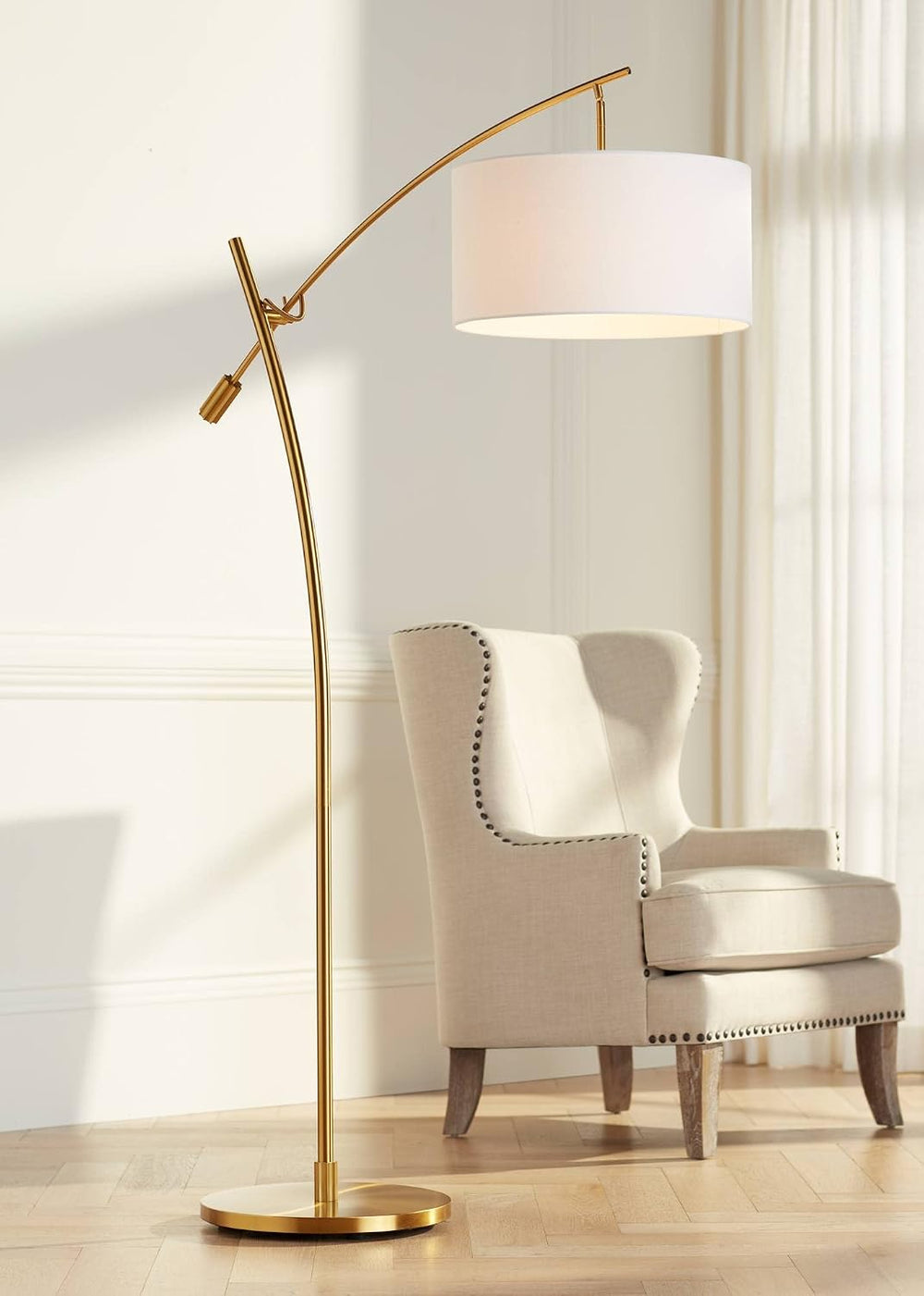 Raymond Warm Gold Adjustable Boom Arc 69" Tall Floor Lamp