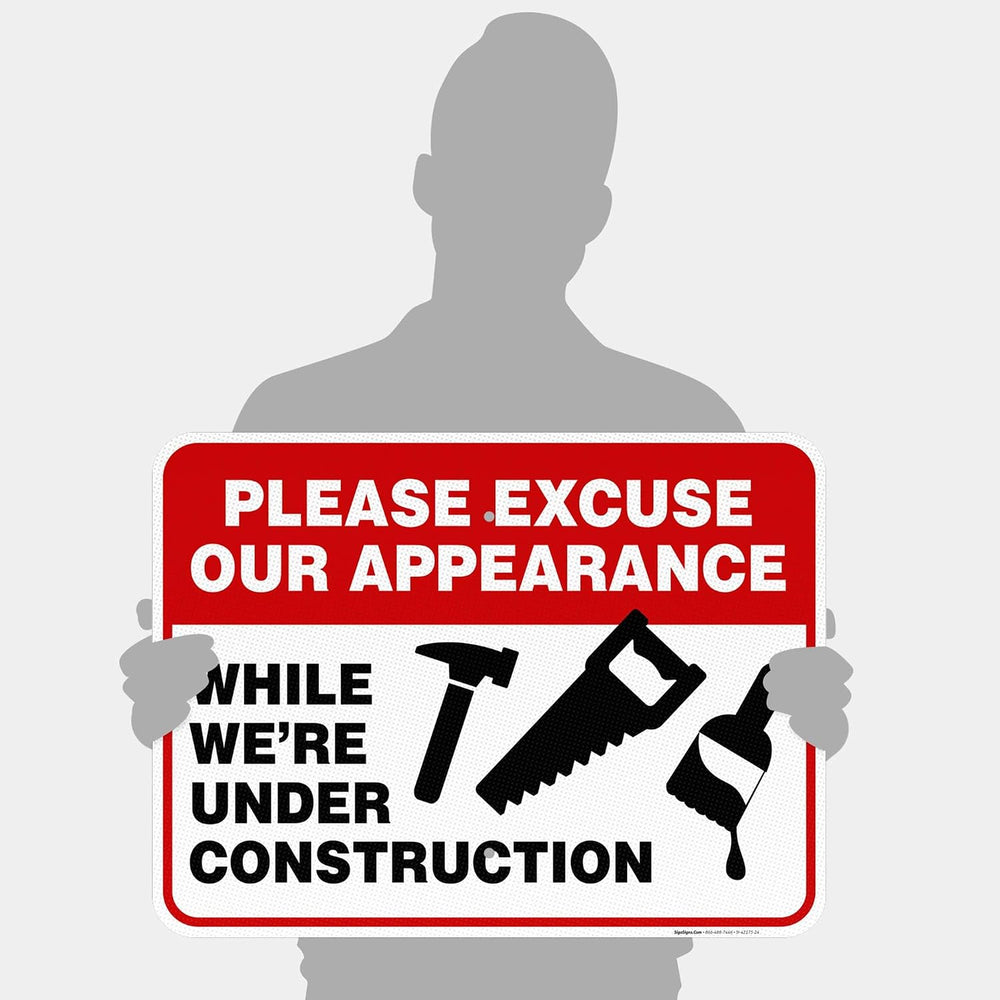 Please Excuse Our Appearance While We're Under Construction Sign,