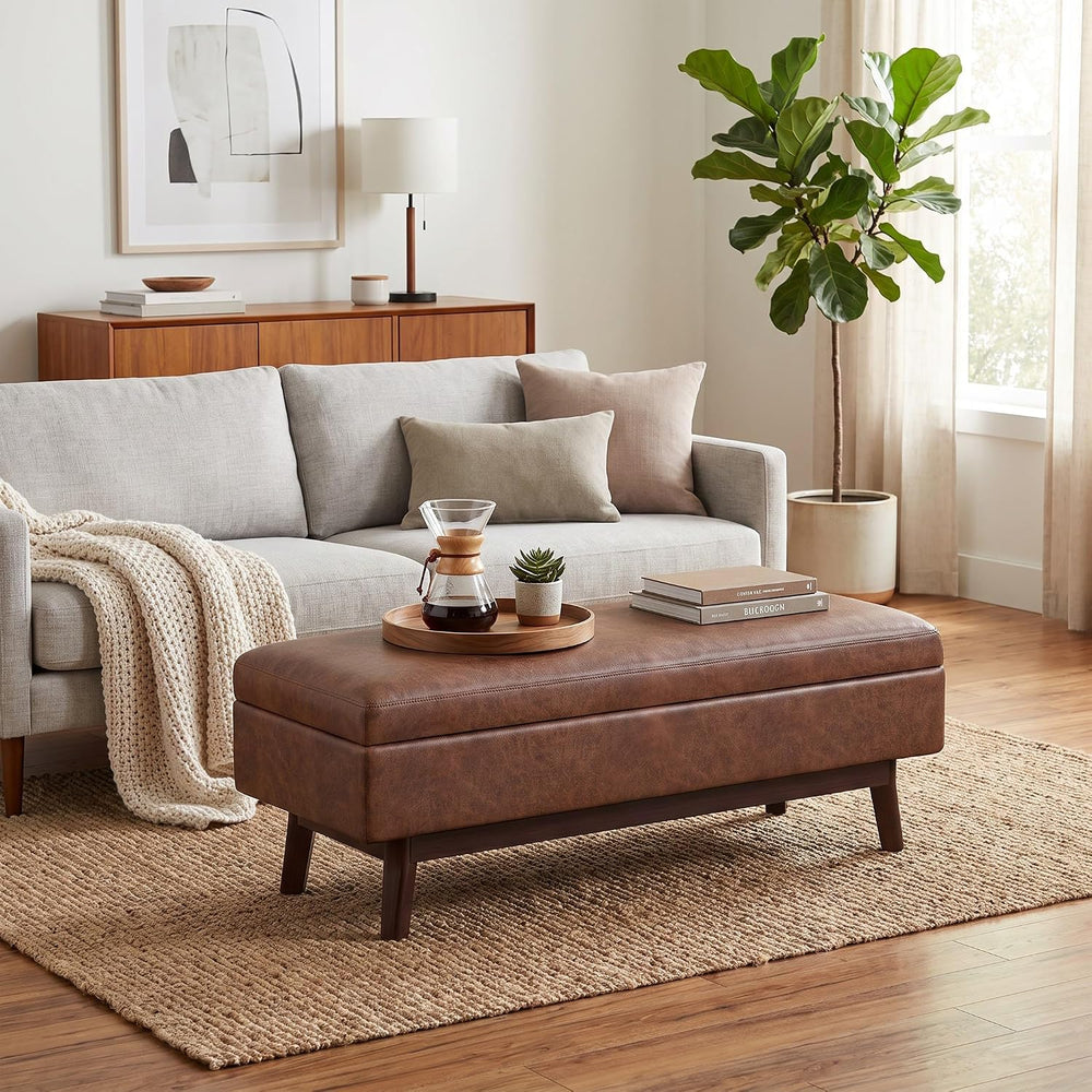 SIMPLIHOME Owen 48" Wide Vegan Leather Lift Top Ottoman in Saddle Brown