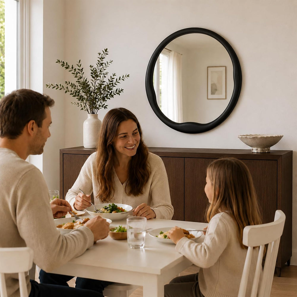 Matte Black 24 Inch Round Wood Wall Mirror, Asymmetrical Inner Edge