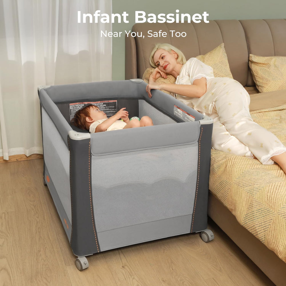 Pamo babe Deluxe Pack and Play with Bassinet & Changing Table