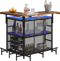 HOOBRO Home Bar Unit, L-Shaped Bar Table with Glasses Holder & 4-Tier Shelves, Corner Mini Liquor Cabinet with Footrest & LED Light APP Control for Home, Pub, Rustic Brown and Black BF129DBT01