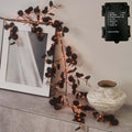 Hairui Lighted Black Eucalyptus Garland with Timer 96 LED Orange and Warm White Fairy Lights,Halloween Garland with Lights 6FT Battery Operated with 10 Functions for Fireplace Halloween Decoration