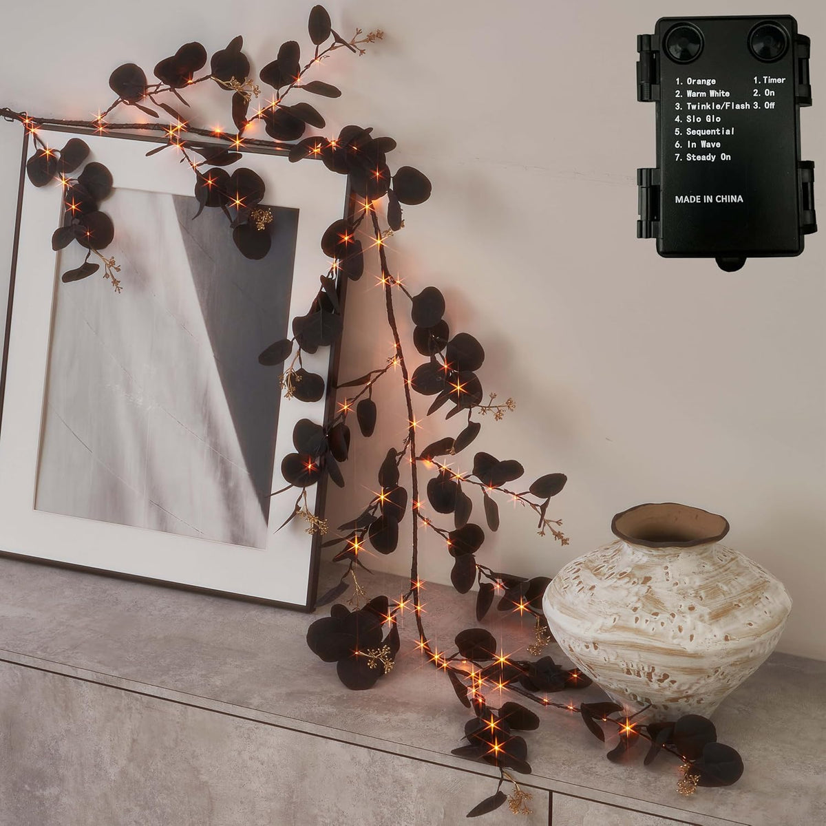 Hairui Lighted Black Eucalyptus Garland with Timer 96 LED Orange and Warm White Fairy Lights,Halloween Garland with Lights 6FT Battery Operated with 10 Functions for Fireplace Halloween Decoration