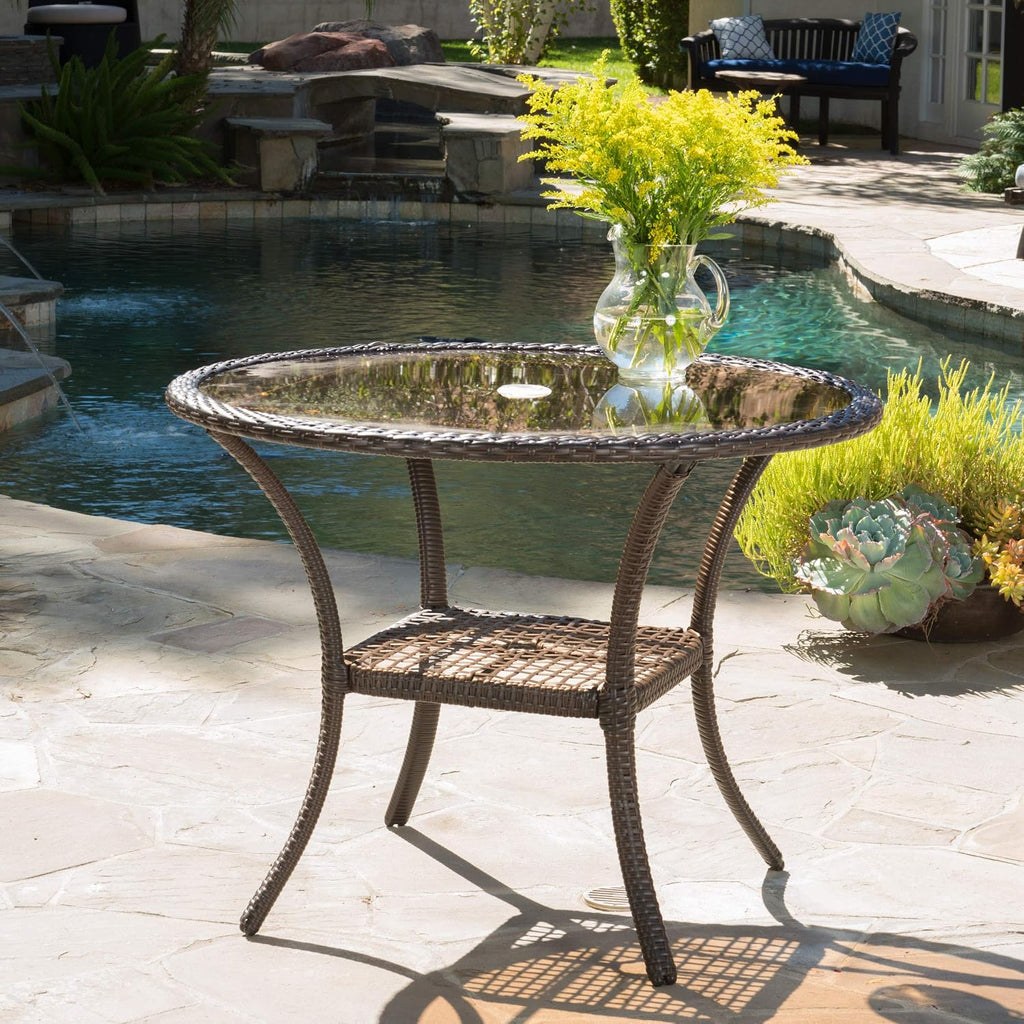 christopher knight home san pico wicker glass table shown in use