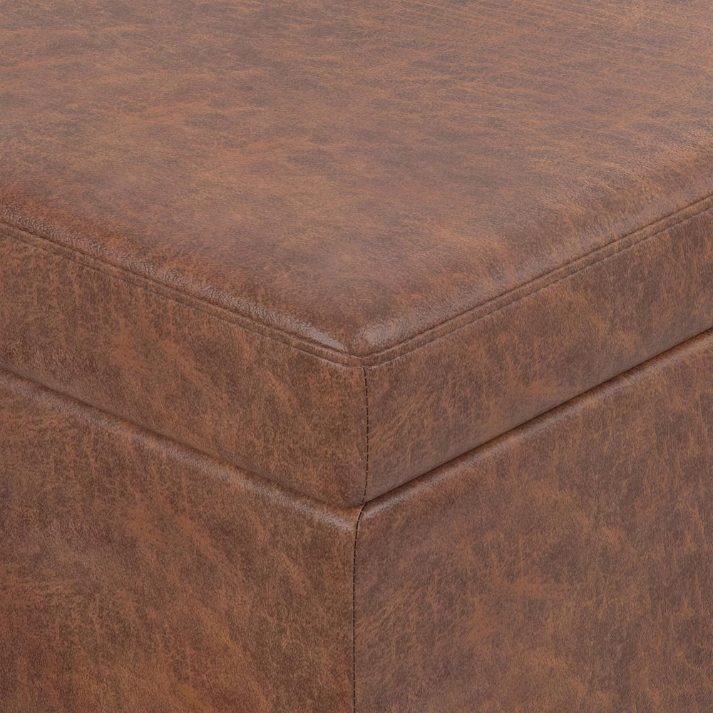 SIMPLIHOME Avalon 48" Wide Vegan Leather Storage Ottoman in Saddle Brown