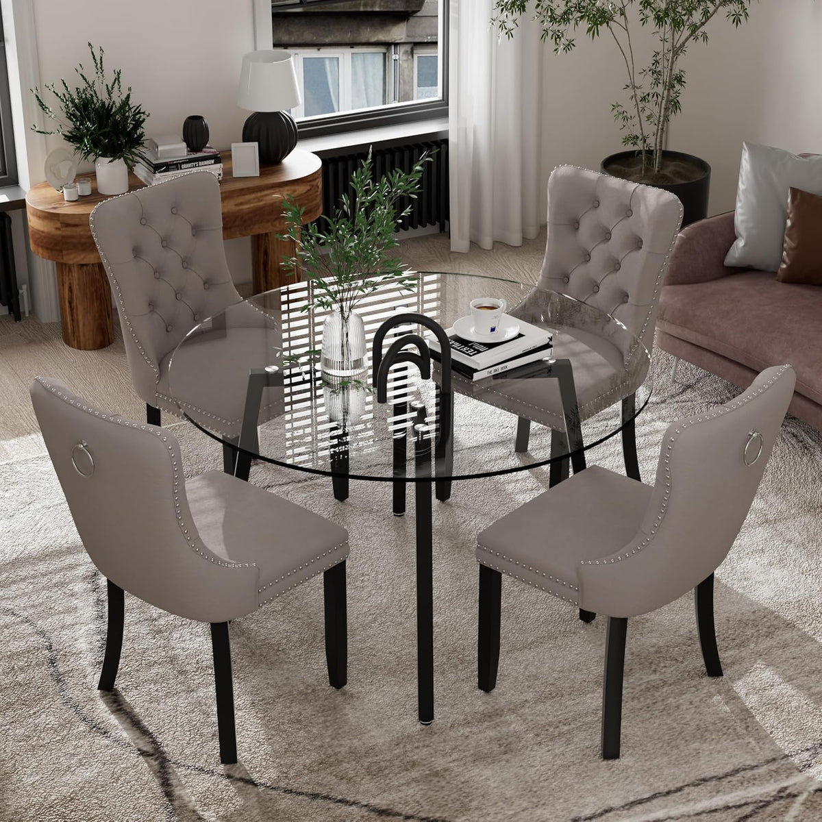 clear round glass top dining set for 4 shown in use